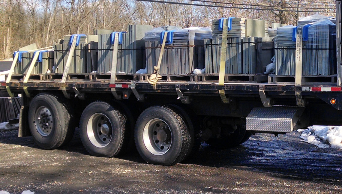 bluestone product delivery on flatbed truck